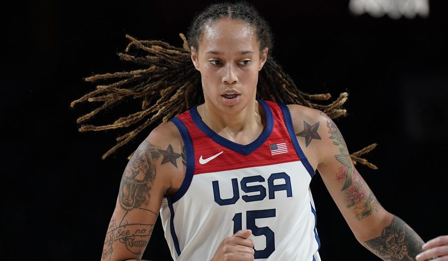 FILE - United States&#x27; Brittney Griner (15) plays during a women&#x27;s basketball preliminary round game against Japan at the 2020 Summer Olympics, Friday, July 30, 2021, in Saitama, Japan. Griner went to Russia to earn extra money. But the experience has turned into a prolonged nightmare after she was arrested in February by police who reported finding vape cartridges allegedly containing cannabis oil in her luggage. She is awaiting trial on charges that could bring a prison term.(AP Photo/Eric Gay, File)