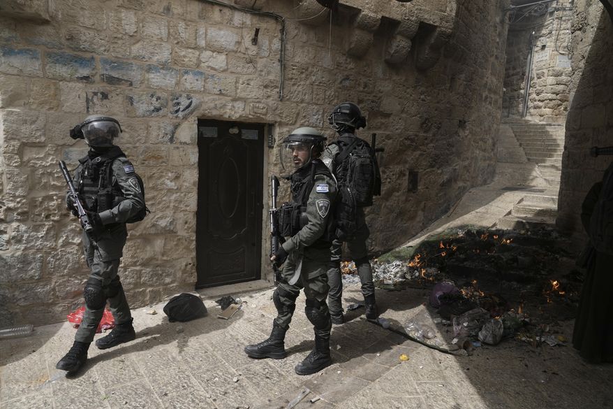 Israeli police is deployed in the Old City of Jerusalem, Sunday, April 17, 2022. Israeli police clashed with Palestinians outside Al-Aqsa Mosque after police cleared Palestinians from the sprawling compound to facilitate the routine visit of Jews to the holy site and accused Palestinians of stockpiling stones in anticipation of violence. (AP Photo/Mahmoud Illean)