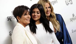 FILE - Television personalities Kris Jenner, from left, Kylie Jenner and Khloe Kardashian attend the NBCUniversal Cable Entertainment 2015 Upfront at The Javits Center on Thursday, May 14, 2015, in New York. On Monday, April 18, 2022, Kris and Kylie Jenner, along with Kim and Khloe Kardashian, sat in the front row of a Los Angeles courtroom as prospective jurors aired their feelings about the famous family and the four women, all defendants in a lawsuit brought by Rob Kardashian&#39;s former fiancée Blac Chyna. (Photo by Evan Agostini/Invision/AP, File)
