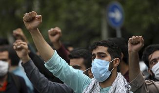 Protesters chant slogans during a demonstration to condemn planned Quran burnings by a right-wing group in Sweden, in front of the Swedish Embassy in Tehran, Iran, Monday, April 18, 2022. Sweden has seen unrest, scuffles and violence since Thursday, triggered by Danish far-right politician Rasmus Paludan&#39;s meetings and planned Quran burnings across the country. (AP Photo/Vahid Salemi)