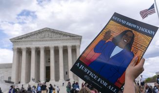 People celebrate the confirmation of Judge Ketanji Brown Jackson the first Black woman to reach the Supreme Court during a rally outside of the U.S. Supreme Court on Capitol Hill, in Washington, Friday, April 8, 2022. ( AP Photo/Jose Luis Magana) ** FILE **