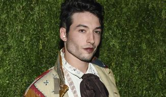 Ezra Miller attends the 15th annual CFDA/Vogue Fashion Fund event at the Brooklyn Navy Yard, Nov. 5, 2018, in New York. The  actor known for playing &amp;quot;The Flash&amp;quot; in &amp;quot;Justice League&amp;quot; films was arrested at a Hawaii karaoke bar and is scheduled to be arraigned on Tuesday, April19, 2022, on charges of disorderly conduct, harassment and obstructing a highway.  (Photo by Evan Agostini/Invision/AP, File)