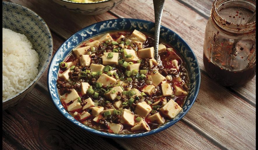 This image shows a recipe for Japanese-Style Mapo Tofu from the cookbook "The Wok: Recipies and Techniques," by J. Kenji López-Alt. (J. Kenji López-Alt/W. W. Norton & Company via AP)