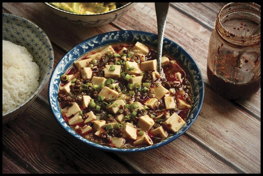 This image shows a recipe for Japanese-Style Mapo Tofu from the cookbook "The Wok: Recipies and Techniques," by J. Kenji López-Alt. (J. Kenji López-Alt/W. W. Norton & Company via AP)