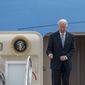 President Joe Biden waves as he boards Air Force One, Thursday, April 21, 2022, at Andrews Air Force Base, Md., en route to Portland, Ore. (AP Photo/Gemunu Amarasinghe)