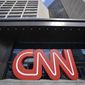 Signage is seen at CNN center, Thursday, April 21, 2022, in Atlanta. CNNs brand-new streaming service, CNN+, is shutting down only a month after launch. In a Thursday memo, incoming CNN chief executive Chris Licht said the service would shut down at the end of April.   (AP Photo/Mike Stewart)
