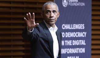 Former President Barack Obama speaks during the Challenges to Democracy in the digital Information Realm symposium hosted by the Cyber Policy Center at Stanford University in Stanford, Calif., Thursday, April 21, 2022. (Jessica Christian/San Francisco Chronicle via AP)