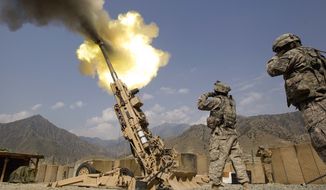 A 155mm round is fired from a 777 Howitzer canon at insurgents during a firing mission by soldiers with 2nd Platoon, Charlie Battery, 3rd Battalion, 321 Field Artillery Regiment out of Fort Bragg, N.C., July 8, 2011, at Forward Operating Base Bostick in Kunar province, Afghanistan. The Biden administration&#39;s decision to dramatically ramp up delivery of artillery guns to Ukraine eight weeks into the war signals a deepening American military commitment at a pivotal stage of fighting for the country&#39;s industrial heartland. (AP Photo/David Goldman, File)