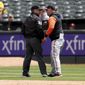 Baltimore Orioles manager Brandon Hyde, right, argues with umpire Rob Drake, left, after being ejected from a baseball game against the Oakland Athletics during the fourth inning in Oakland, Calif., Thursday, April 21, 2022. (AP Photo/Jed Jacobsohn)