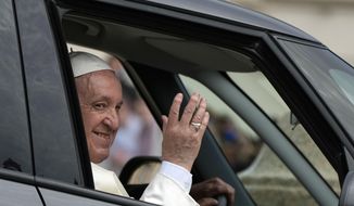 Pope Francis waves as he leaves his weekly general audience in St. Peter&#39;s Square, at the Vatican, Wednesday, April 20, 2022. (AP Photo/Alessandra Tarantino)
