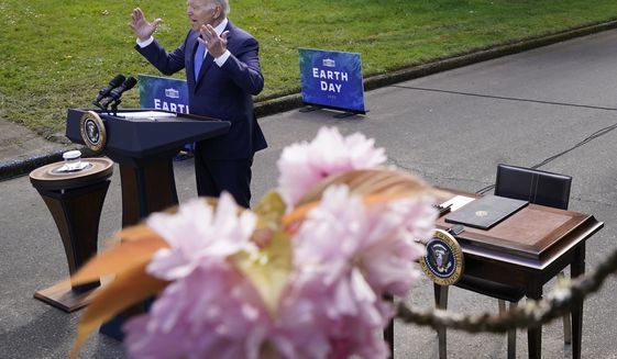 President Joe Biden speaks at Seward Park on Earth Day, Friday, April 22, 2022, in Seattle. (AP Photo/Andrew Harnik)