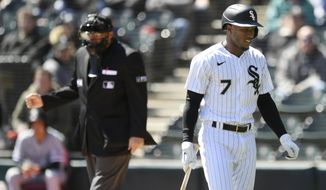 Chicago White Sox&#39;s Tim Anderson walks away after striking out during the first inning of the team&#39;s baseball game against the Seattle Mariners on Thursday, April 14, 2022, in Chicago. The Mariners won 5-1. (AP Photo/Paul Beaty)