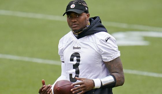 Pittsburgh Steelers quarterback Dwayne Haskins works during the team&#39;s NFL minicamp football practice in Pittsburgh, Tuesday, June 15, 2021. The wife of Pittsburgh Steelers quarterback Dwayne Haskins called Florida 911 dispatchers shortly after he was fatally struck by a dump truck earlier this month, saying his car had run out of gas and she was worried because he wasn&#39;t answering the phone, according to recordings released Wednesday, April 20, 2022. (AP Photo/Gene J. Puskar, File)