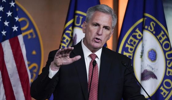 House Minority Leader Kevin McCarthy, R-Calif., responds to reporters at the Capitol in Washington, Friday, Dec. 3, 2021. (AP Photo/J. Scott Applewhite, File)
