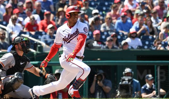 Washington Nationals right fielder Juan Soto (22) following through on his swing during the 3rd inning in a game against the San Francisco Giants at Nationals Park in Washington D.C., April 24, 2022. (Photo by All-Pro Reels)