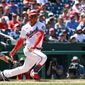 Washington Nationals right fielder Juan Soto (22) following through on his swing during the 3rd inning in a game against the San Francisco Giants at Nationals Park in Washington D.C., April 24, 2022. (Photo by All-Pro Reels)