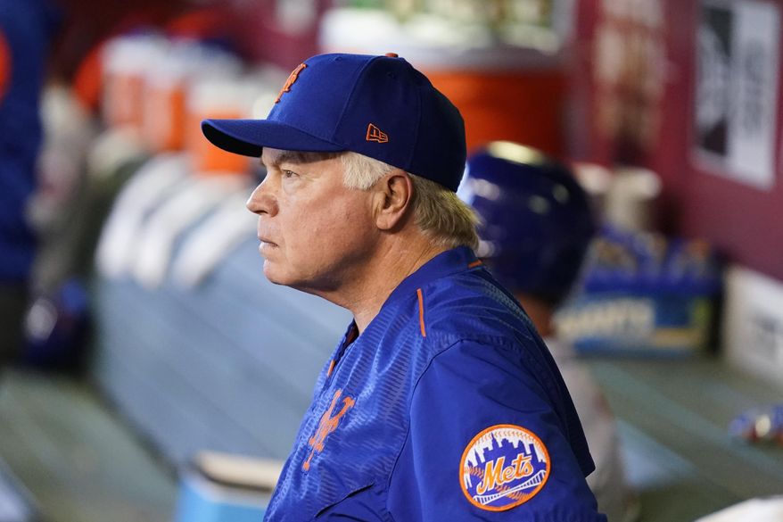 New York Mets manager Buck Showalter pauses in the dugout prior to a baseball game against the Arizona Diamondbacks, Sunday, April 24, 2022, in Phoenix. (AP Photo/Ross D. Franklin) **FILE**
