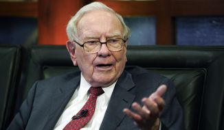 In this May 7, 2018 file photo, Berkshire Hathaway Chairman and CEO Warren Buffett speaks during an interview in Omaha, Neb. The world&#39;s most expensive lunch will go on sale again this spring when Buffett auctions off a private meal to raise money for a California homeless charity one last time. Buffett held the online lunch auction once a year for 20 years before the pandemic began to raise money for the Glide Foundation, which helps the homeless in San Francisco. (AP Photo/Nati Harnik, file)