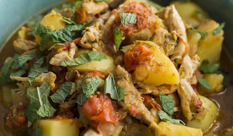 This image released by Milk Street shows a recipe for Cape Malay Chicken Curry. (Milk Street via AP)
