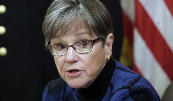 Kansas Gov. Laura Kelly speaks during an event at the Kansas Statehouse in Topeka, Kan., Thursday, March 24, 2022. The Democratic governor has vetoed a Republican measure to ban transgender athletes from girls&#39; and women&#39;s sports and a GOP measure aimed at making it easier for parents to try to remove materials from public school classrooms and libraries. (AP Photo/John Hanna)