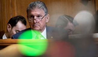 Sen. Joe Manchin, D-W.Va., listens during a Senate Appropriations Subcommittee on Commerce, Justice, Science, and Related Agencies hearing to discuss the fiscal year 2023 budget of the Department of Justice at the Capitol in Washington, Tuesday, April 26, 2022. (Greg Nash/Pool Photo via AP) **FILE**