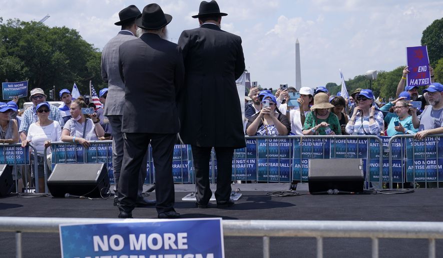 People attend the &quot;NO FEAR: Rally in Solidarity with the Jewish People&quot; event in Washington, Sunday, July 11, 2021, co-sponsored by the Alliance for Israel, Anti-Defamation League, American Jewish Committee, B&#39;nai B&#39;rith International and other organizations. A Jewish civil rights organizations annual tally of antisemitic incidents in the U.S. reached a record high last year, with a surge that coincided with an 11-day war between Israel and the Hamas militant group, according to a report released Tuesday, April 26, 2022. (AP Photo/Susan Walsh, File)
