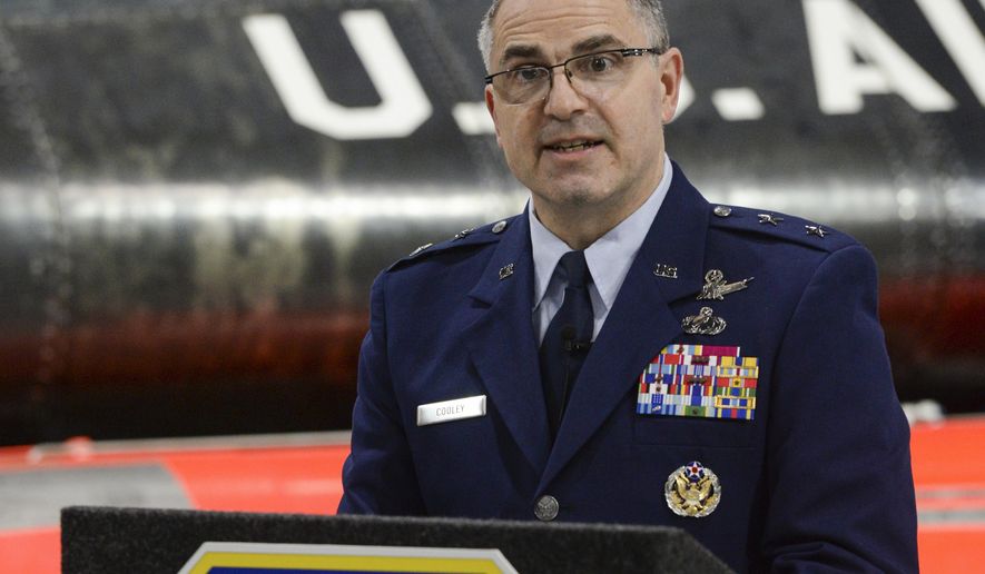 U.S. Air Force Maj. Gen. William T. Cooley, Air Force Research Laboratory commander, delivers remarks during a press conference inside the National Museum of the United States Air Force, Wright-Patterson Air Force Base, Ohio, on April 18, 2019. Cooley, has been convicted, Saturday, April 23, 2022, by a military judge of one of three specifications of abusive sexual contact in the first-ever military trial of an Air Force general.   (Wesley Farnsworth/U.S. Air Force via AP)
