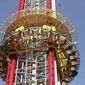 FILE - The Orlando Free Fall drop tower in ICON Park in Orlando is pictured on Monday, March 28, 2022.  The parents of a 14-year-old boy who fell to his death from a 430-foot drop-tower ride in central Florida’s tourist district have sued its owner, manufacturer and landlord, claiming they were negligent and failed to provide a safe amusement ride. The lawsuit was filed Monday, April 25, 2022, in state court in Orlando.   (Stephen M. Dowell/Orlando Sentinel via AP, File)