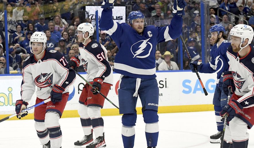 Tampa Bay Lightning center Steven Stamkos (91) celebrates his goal during the second period of an NHL hockey game against the Columbus Blue Jackets Tuesday, April 26, 2022, in Tampa, Fla. The goal gave Stamkos 100 points this season. (AP Photo/Jason Behnken)