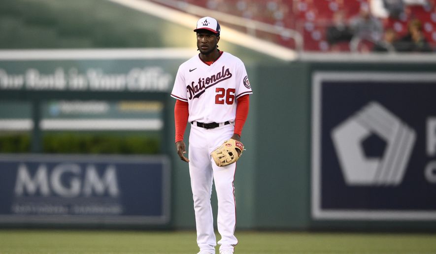 Washington Nationals shortstop Lucius Fox (26) stands on the field during the first inning of a baseball game against the Miami Marlins, Wednesday, April 27, 2022, in Washington. (AP Photo/Nick Wass)