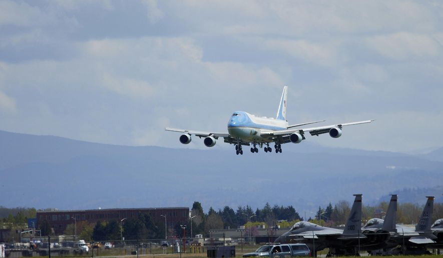 Air Force One with President Joe Biden arrives at Portland International Airport in Portland, Ore., Thursday, April 21, 2022. (AP Photo/Craig Mitchelldyer)