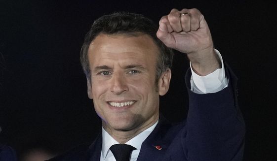 French President Emmanuel Macron celebrates with his supporters in Paris, France, Sunday, April 24, 2022. French President Emmanuel Macron&#39;s reelection has bolstered his standing as a senior player in Europe. Macron is now expected to push for strengthening the 27-nation bloc and throw all his weight behind efforts to end the war in Ukraine. (AP Photo/Christophe Ena, File)