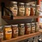This image shows an heirloom spice rack made with mason jars in a kitchen in Allison Park, Pa. When you live in a multigenerational house, deep-time design opportunities lurk around every corner. Opportunities to blend past and present abound. (AP Photo/Ted Anthony)