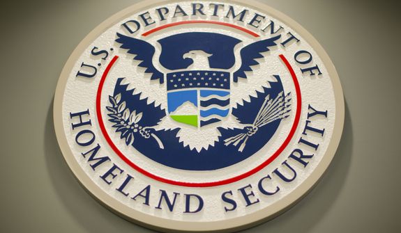 Homeland Security logo is seen during a joint news conference in Washington, Feb. 25, 2015. (AP Photo/Pablo Martinez Monsivais, File)  **FILE**