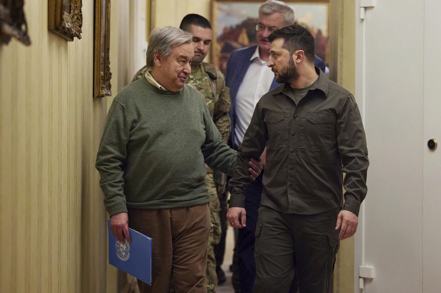 In this image provided by the Ukrainian Presidential Press Office, Ukrainian President Volodymyr Zelenskyy, right, and U.N. Secretary-General Antonio Guterres leave a news conference during their meeting in Kyiv, Ukraine, Thursday, April 28, 2022. (Ukrainian Presidential Press Office via AP)