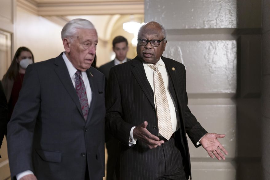 House Majority Leader Steny Hoyer, D-Md., left, and House Majority Whip James Clyburn, D-S.C., talk on their way to a House Democratic Caucus meeting, at the Capitol in Washington, Tuesday, April 5, 2022. (AP Photo/J. Scott Applewhite) **FILE**