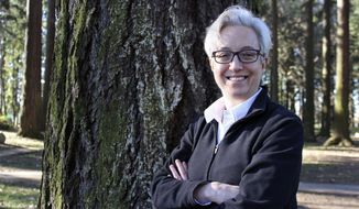 Former Oregon House Speaker Tina Kotek, who is running for governor, poses for photos in Columbia Park in Portland, Ore., on Feb. 18, 2022.  The May 17 primary will determine whether Kotek will be the Democrats&#39; standard-bearer for governor, it&#39;s also another U.S. test of which wing of the Democratic party is ascendant — progressives or moderates.  (AP Photo/Sara Cline)