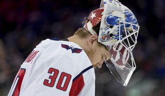 Washington Capitals goaltender Ilya Samsonov (30) skates back to the net during a time-out in the first period of an NHL hockey game against the New York Rangers, Friday, April 29, 2022, in New York. (AP Photo/John Minchillo)