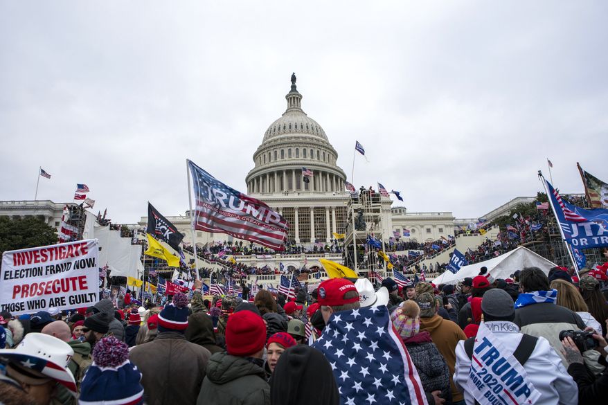 Rioters loyal to President Donald Trump rally at the U.S. Capitol in Washington on Jan. 6, 2021.    A Georgia man affiliated with the Oath Keepers militia group became the second Capitol rioter to plead guilty to seditious conspiracy for his actions leading up and through the attack. The sentencing guidelines for Brian Ulrich, who also pleaded guilty to obstructing an official proceeding, were estimated to be 5 ¼ years to 6 ½ years in prison. (AP Photo/Jose Luis Magana, File)  **FILE**