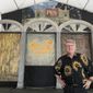 Quint Davis, producer of the New Orleans Jazz &amp;amp; Heritage Festival, stands on a stage of the festival’s Blues Tent on Tuesday, April 26, 2022. The festival opens on Friday, April 28, for the first time in three years, having been postponed in 2020 and 2021 due to the COVID-19 pandemic.  (AP Photo /Kevin McGill)