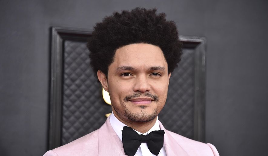 Trevor Noah arrives at the 64th Annual Grammy Awards at the MGM Grand Garden Arena, April 3, 2022, in Las Vegas. (Photo by Jordan Strauss/Invision/AP, File)