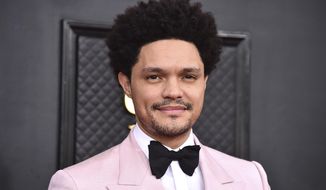 Trevor Noah arrives at the 64th Annual Grammy Awards at the MGM Grand Garden Arena, April 3, 2022, in Las Vegas. The White House press corps is ready to party like it&#39;s 2019, before the coronavirus pandemic. After the pandemic nixed the 2021 and 2020 editions, the White House Correspondents’ Association dinner returns Saturday night. It features Joe Biden, the first sitting president to attend in six years. (Photo by Jordan Strauss/Invision/AP, File)