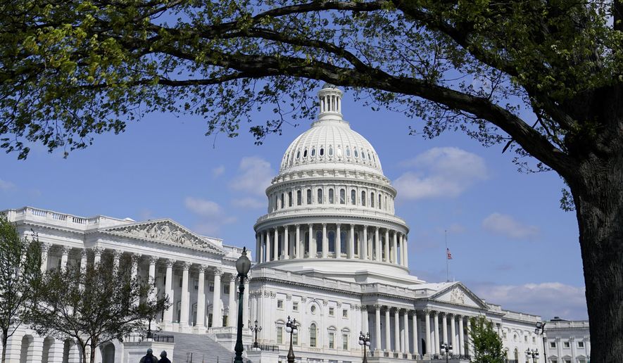 The U.S. Capitol on a sunny morning, April 27, 2022, in Washington. (AP Photo/Mariam Zuhaib, File)