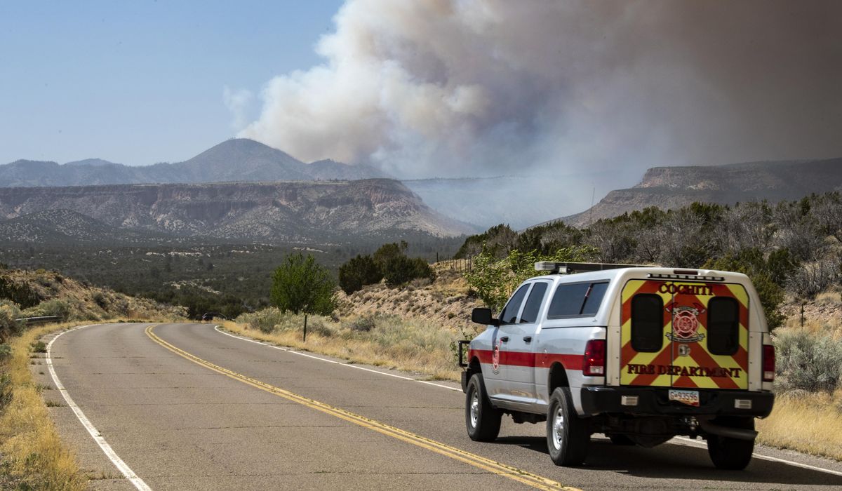NextImg:Forest Service burn started wildfire that nearly reached Los Alamos, N.M., agency says
