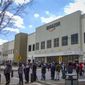 In this image from video, Amazon workers line up outside the company&#39;s Staten Island warehouse to vote on unionization, Friday, March 25, 2022, in New York. Amazon and the nascent group that successfully organized the company’s first-ever U.S. union are headed for a rematch Monday, May 2, 2022, when a federal labor board will tally votes cast by warehouse workers in yet another election on Staten Island. (AP Photo/Robert Bumsted) **FILE**