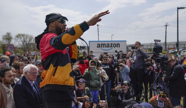 Christian Smalls, president of the Amazon Labor Union, speaks at a rally outside an Amazon facility on Staten Island in New York, Sunday, April 24, 2022. Amazon and the nascent group that successfully organized the company’s first-ever U.S. union are headed for a rematch Monday, May 2, 2022, when a federal labor board will tally votes cast by warehouse workers in yet another election on Staten Island. (AP Photo/Seth Wenig) **FILE**