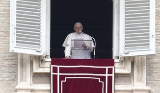 Pope Francis delivers his message from his studio window overlooking St. Peter&#39;s Square during the Regina Coeli prayer at the Vatican, Sunday, May 1, 2022. (AP Photo/Gregorio Borgia)