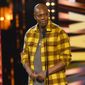 Dave Chappelle appears during the Rock &amp; Roll Hall of Fame induction ceremony on Oct. 30, 2021, in Cleveland. Chappelle was tackled during a performance at the Hollywood Bowl Tuesday, May 3, 2022. Security guards chased and overpowered the attacker, and Chappelle was able to continue his performance while the man was taken away in an ambulance. (AP Photo/David Richard) **FILE**