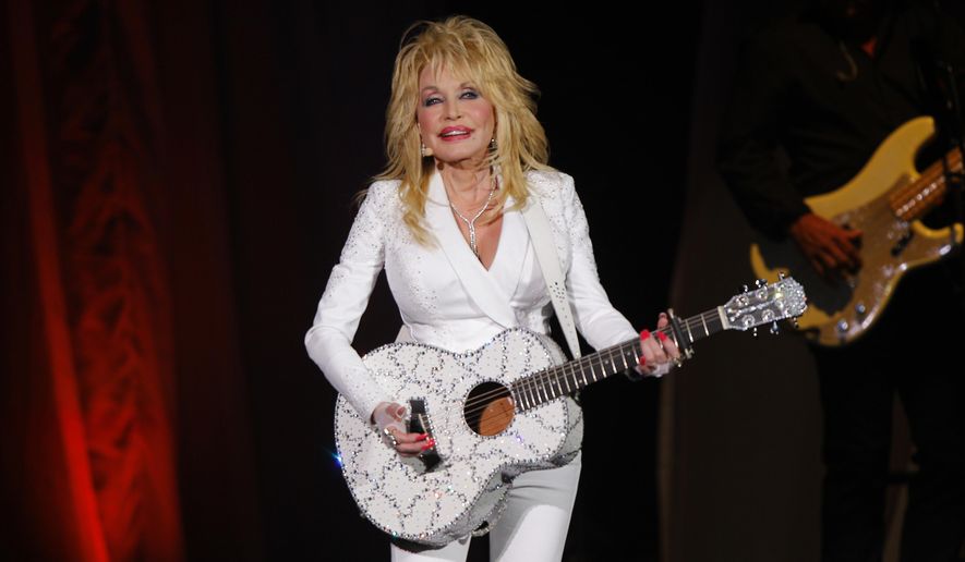 Dolly Parton performs in concert on July 31, 2015, in Nashville, Tenn. Parton has been inducted into the Rock &amp;amp; Roll Hall of Fame. (Photo by Wade Payne/Invision/AP, File)