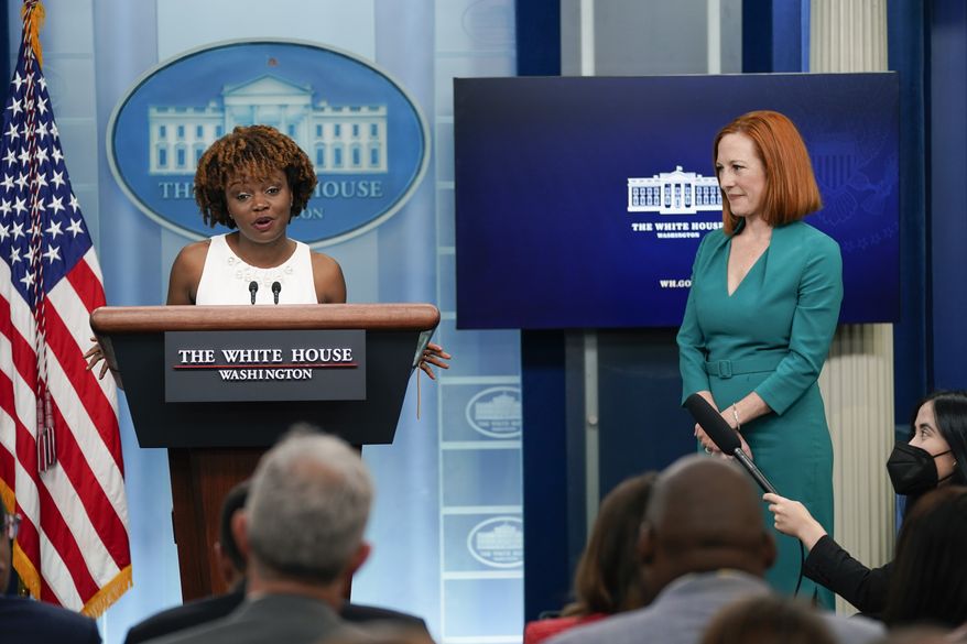 White House press secretary Jen Psaki, right, listens as incoming press secretary Karine Jean-Pierre speaks during a press briefing at the White House, Thursday, May 5, 2022, in Washington. (AP Photo/Evan Vucci)